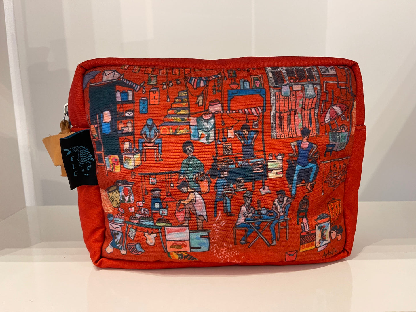 Red artistic printed padded toiletry bag