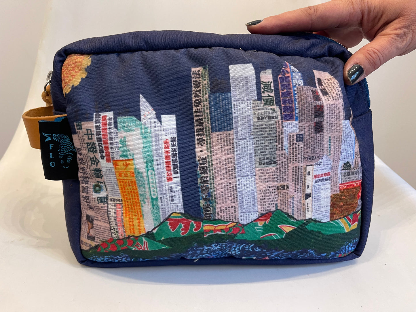 Blue artistic printed padded toiletry bag